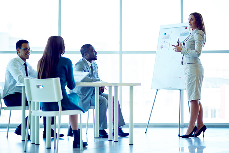 woman-conducting-meeting Woman Conducting a Meeting